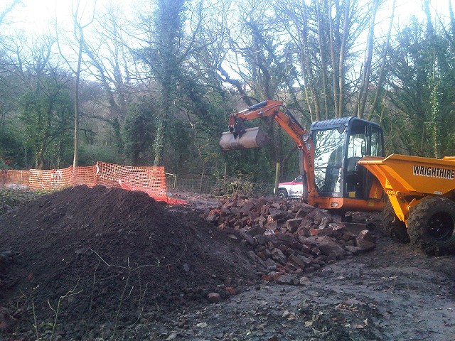 Moving spoil heaps.