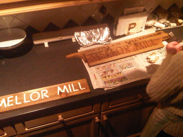 Making the signs.